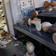 A looted wig shop, the morning after.